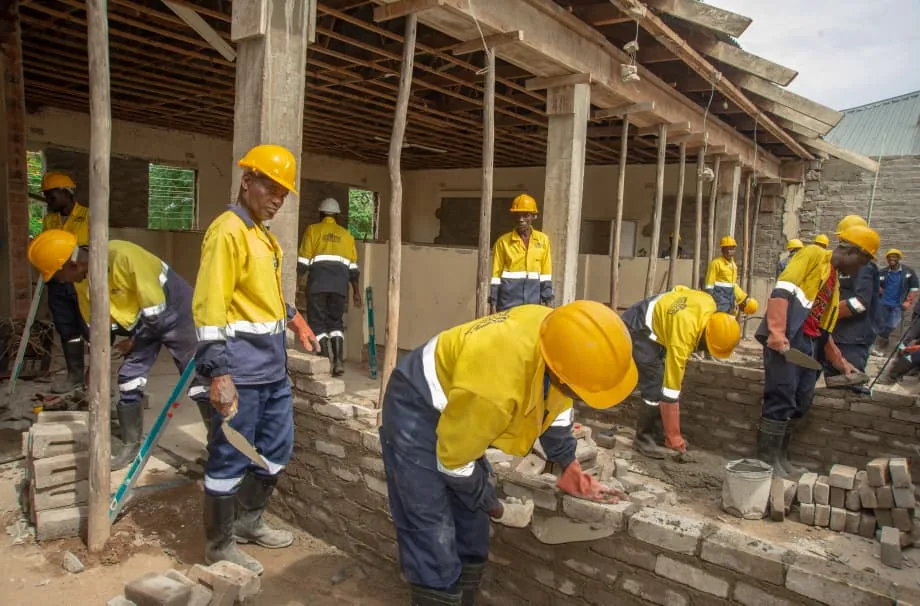 Elegance Ivy construction workers building masonry walls