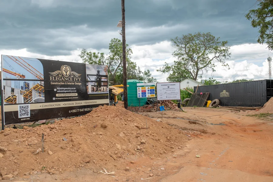 Elegance Ivy site hoarding, safety signs and organised site entrance