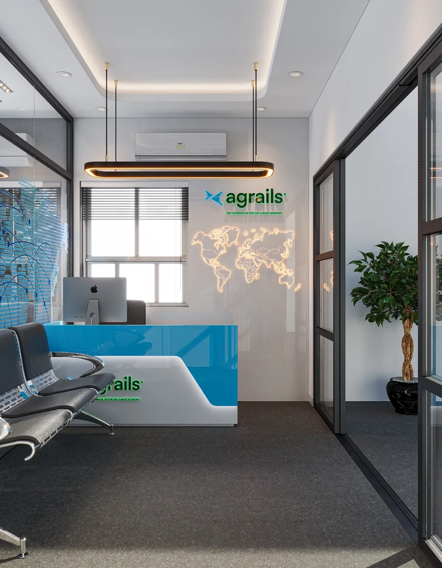 Reception design with a blue counter, glazed partitions and visitor seating